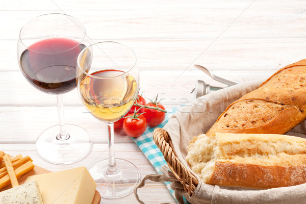White and red wine, cheese and bread Stock photo © karandaev