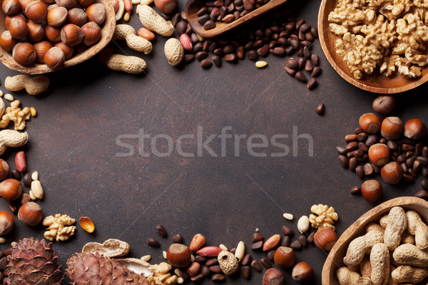 Stock photo: Various nuts on stone table
