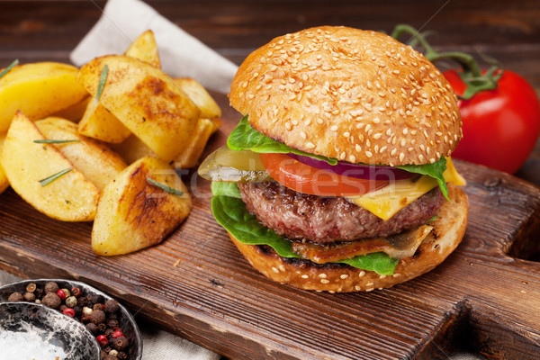 Tasty grilled home made burger Stock photo © karandaev