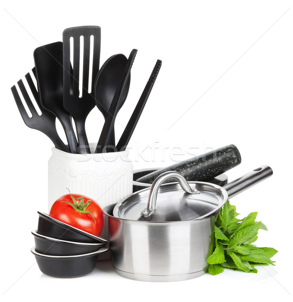Kitchen utensils, tomato and mint leaves Stock photo © karandaev
