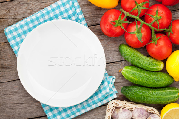 Stock photo: Fresh ripe vegetables on wooden table