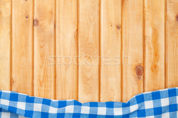 Blue towel over wooden kitchen table Stock photo © karandaev