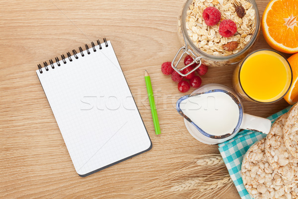Stock photo: Healty breakfast with muesli, berries and orange juice