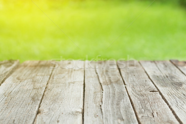 Jardín mesa de madera verde bokeh hierba Foto stock © karandaev