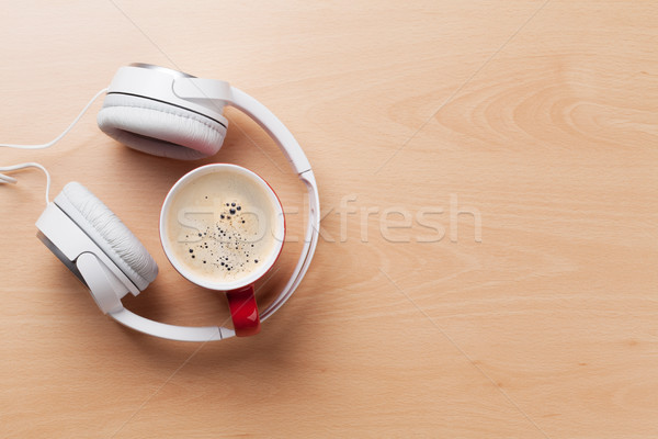 Headphones and coffee cup Stock photo © karandaev