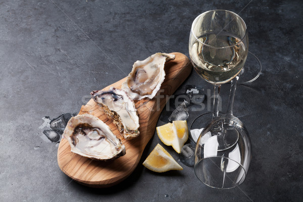 Oysters and wine Stock photo © karandaev