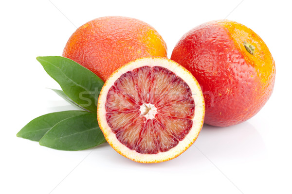Red oranges with leafs Stock photo © karandaev
