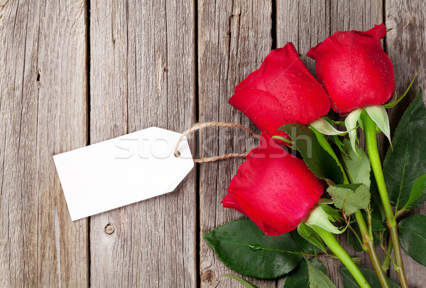 Red roses bouquet with tag Stock photo © karandaev