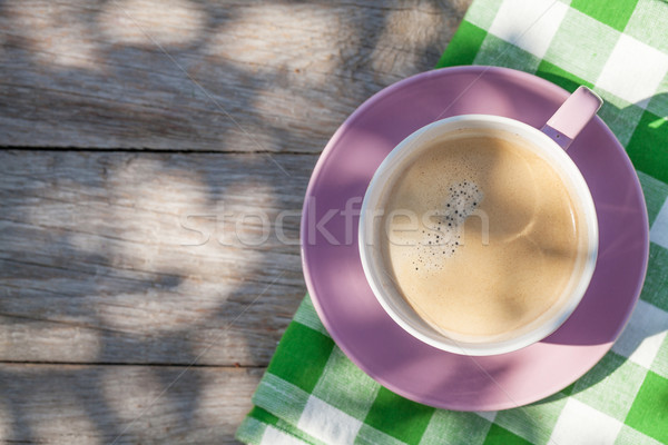 Stock photo: Coffee cup on garden table