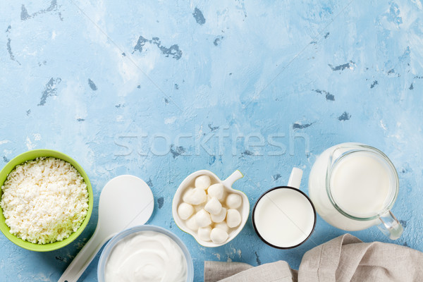 Tejtermékek kő asztal tejföl tej sajt Stock fotó © karandaev