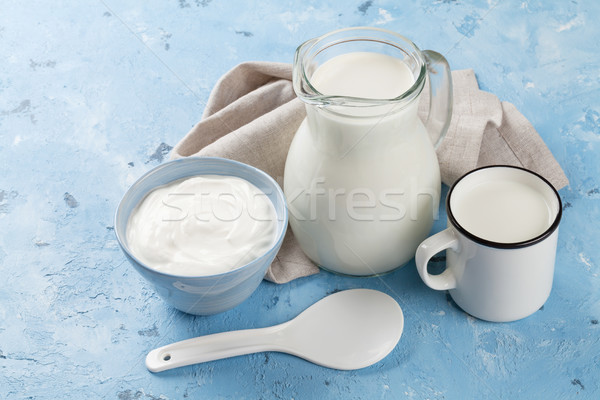 Tejtermékek kő asztal tejföl tej üveg Stock fotó © karandaev