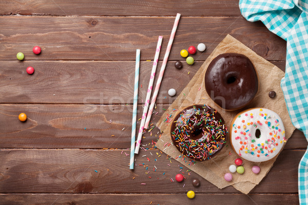 Donuts and candies Stock photo © karandaev