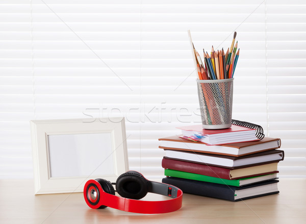 Lavoro photo frame cuffie libri ufficio matite Foto d'archivio © karandaev