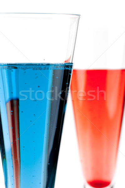 Red and Blue Champagne alcohol cocktail Stock photo © karandaev