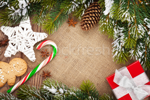 Christmas food, decor and gift box with snow fir tree Stock photo © karandaev