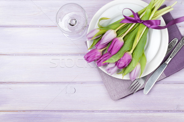 Purple tulip bouquet over plate Stock photo © karandaev