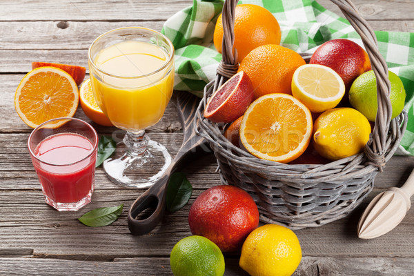 Citrus fruits and juice Stock photo © karandaev