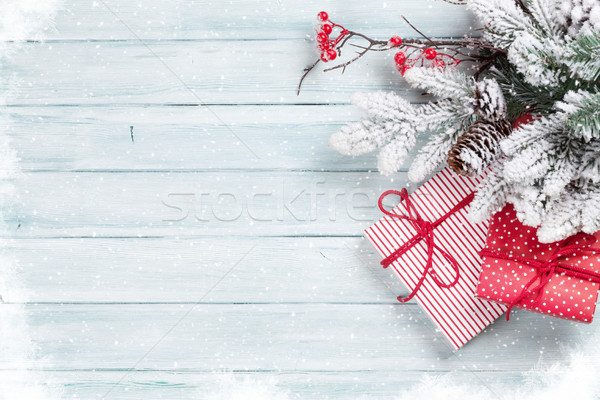 Christmas gift boxes and fir tree Stock photo © karandaev