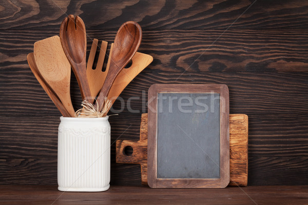 Kitchen utensils and chalkboard Stock photo © karandaev