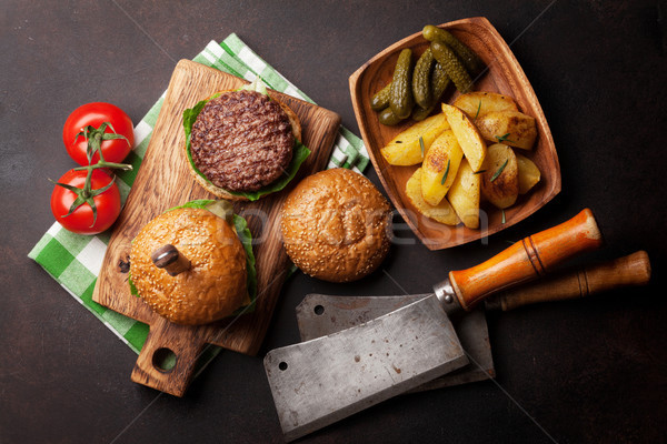 Tasty grilled home made burgers Stock photo © karandaev