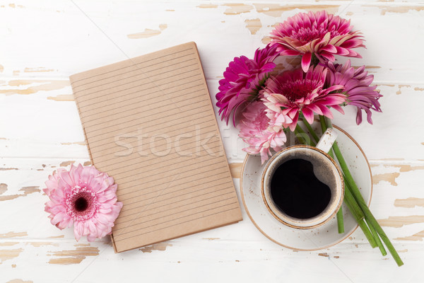 Coffee cup and gerbera flowers Stock photo © karandaev