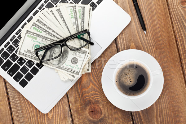 Stock photo: Office table with pc, supplies and money cash