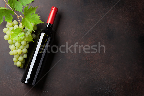 бутылку вина виноград каменные таблице Top мнение Сток-фото © karandaev