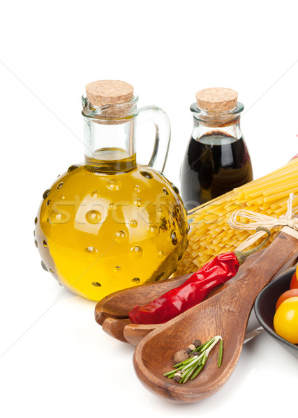 Olive oil, vinegar, tomatoes and pasta Stock photo © karandaev
