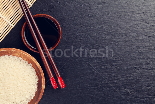 Japonés sushi palillos salsa de soja tazón arroz Foto stock © karandaev