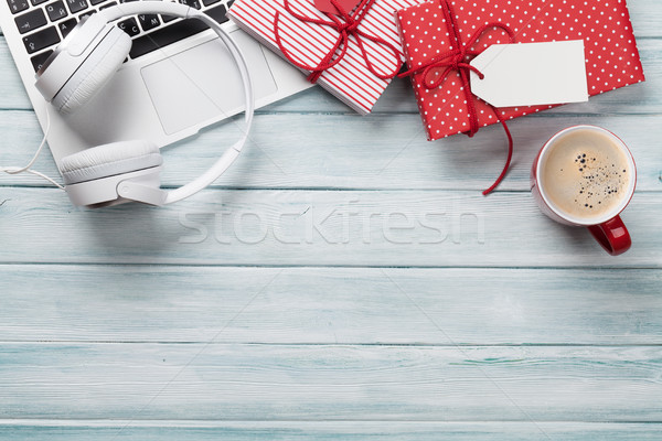 Christmas gift boxes, pc and coffee cup on wood Stock photo © karandaev