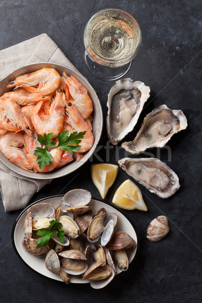 Fresh seafood and white wine Stock photo © karandaev
