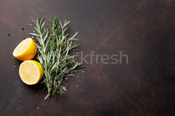 Herbs and spices on stone table Stock photo © karandaev