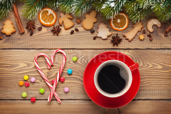 Coffee cup and christmas food decor on wooden background Stock photo © karandaev