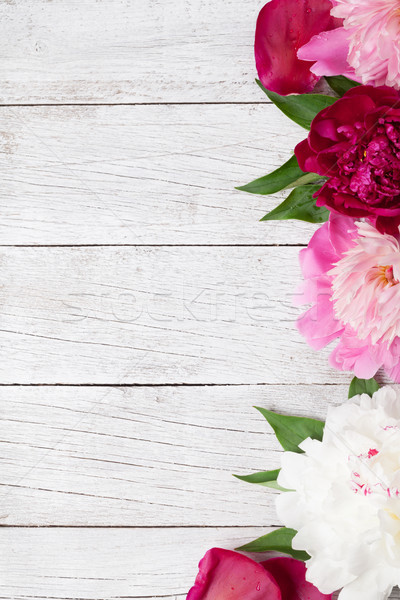 Stock photo: Garden peony flowers on wood