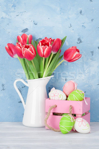 Red tulip flowers and easter eggs Stock photo © karandaev