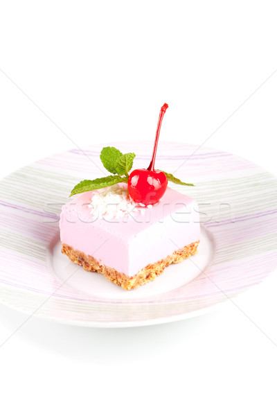 Pink cheesecake with maraschino cherry and mint Stock photo © karandaev