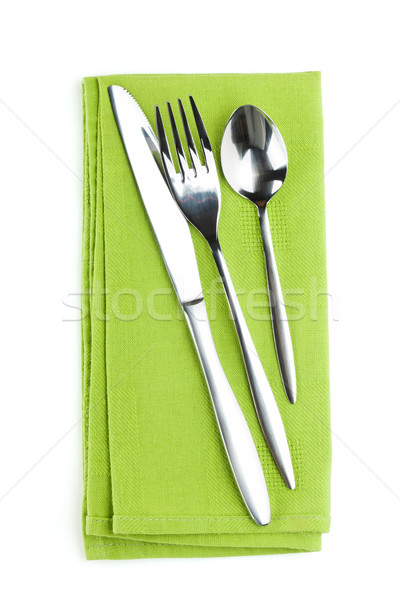 Stock photo: Silverware or flatware set of fork, spoon and knife on towel