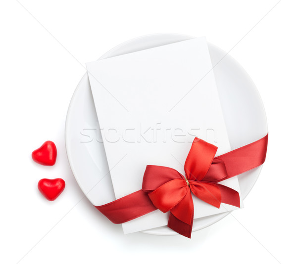 Valentine's Day love letter over plate with red bow Stock photo © karandaev