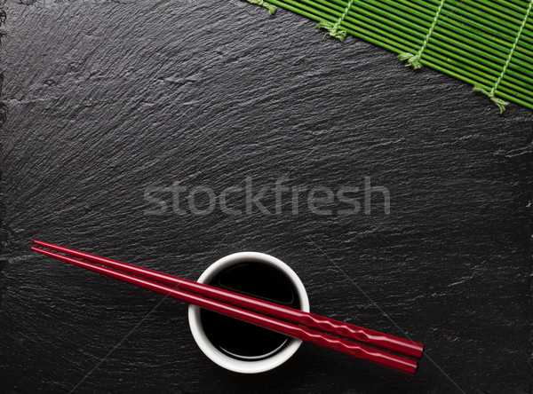 Japanese sushi bacchette salsa di soia ciotola nero Foto d'archivio © karandaev