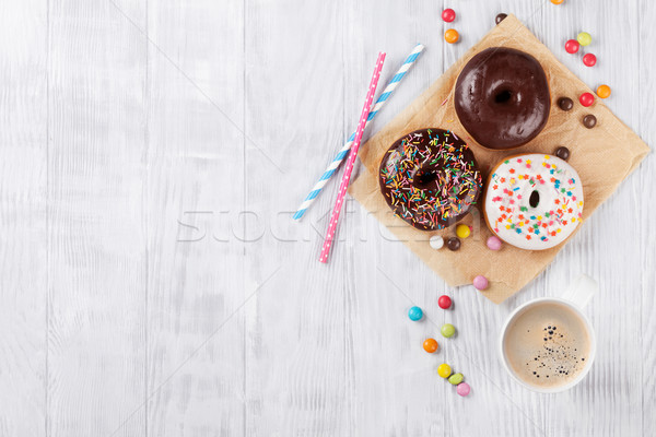 Donuts and coffee Stock photo © karandaev