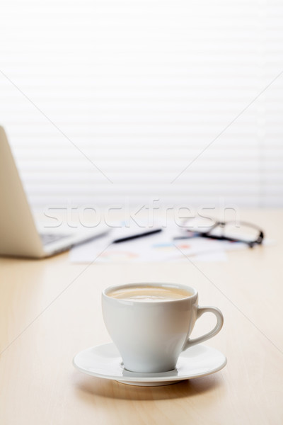 Office desk workplace with laptop and coffee Stock photo © karandaev