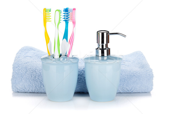 Toothbrushes, liquid soap and towel Stock photo © karandaev