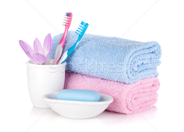 Stock photo: Toothbrushes, soap and two towels