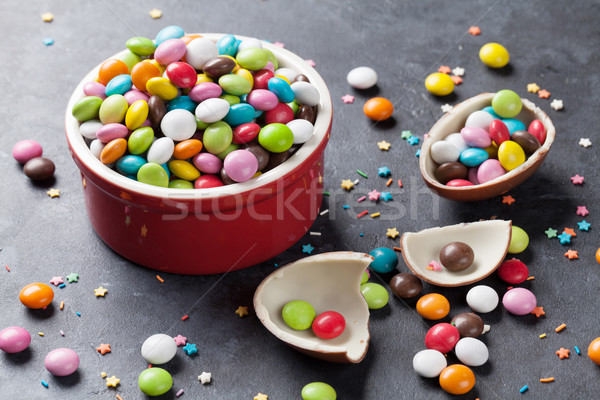 Colorful candies and chocolate egg Stock photo © karandaev