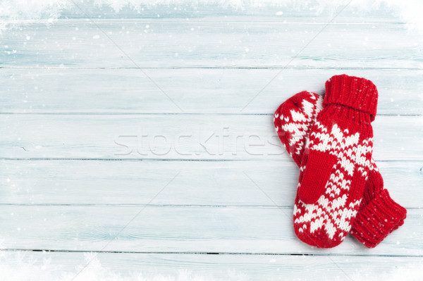 Christmas wooden background with mittens Stock photo © karandaev