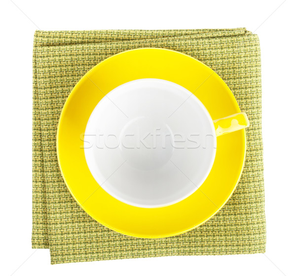 Yellow coffee cup over kitchen towel Stock photo © karandaev