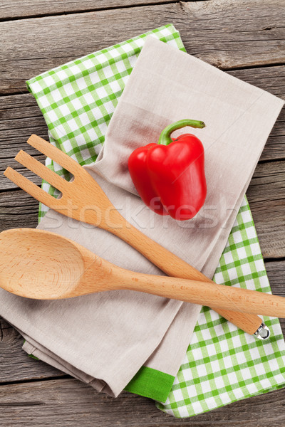 Cooking utensils and bell pepper on wooden table Stock photo © karandaev