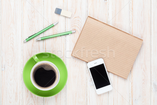 Office desk table with supplies and coffee cup Stock photo © karandaev