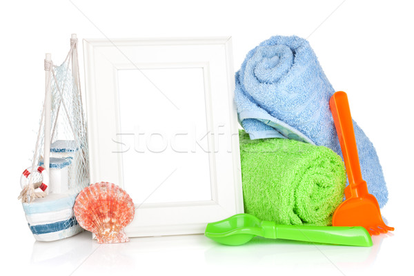 Photo frame with beach towels and toys Stock photo © karandaev