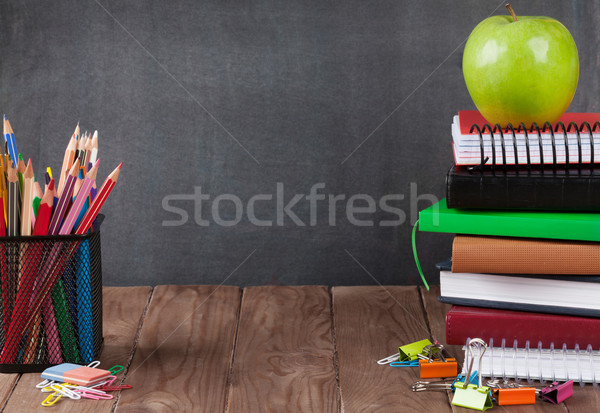 School and office supplies on classroom table Stock photo © karandaev
